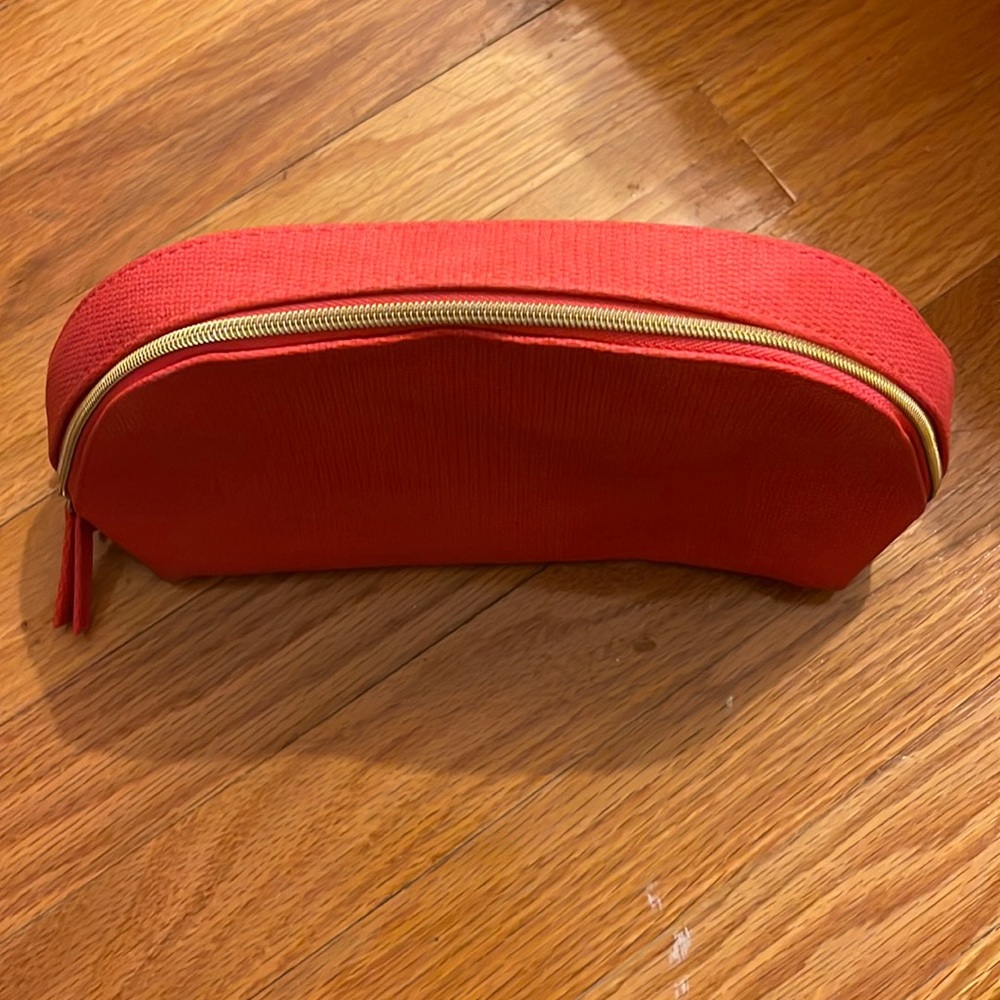 Lancôme cosmetic bag.